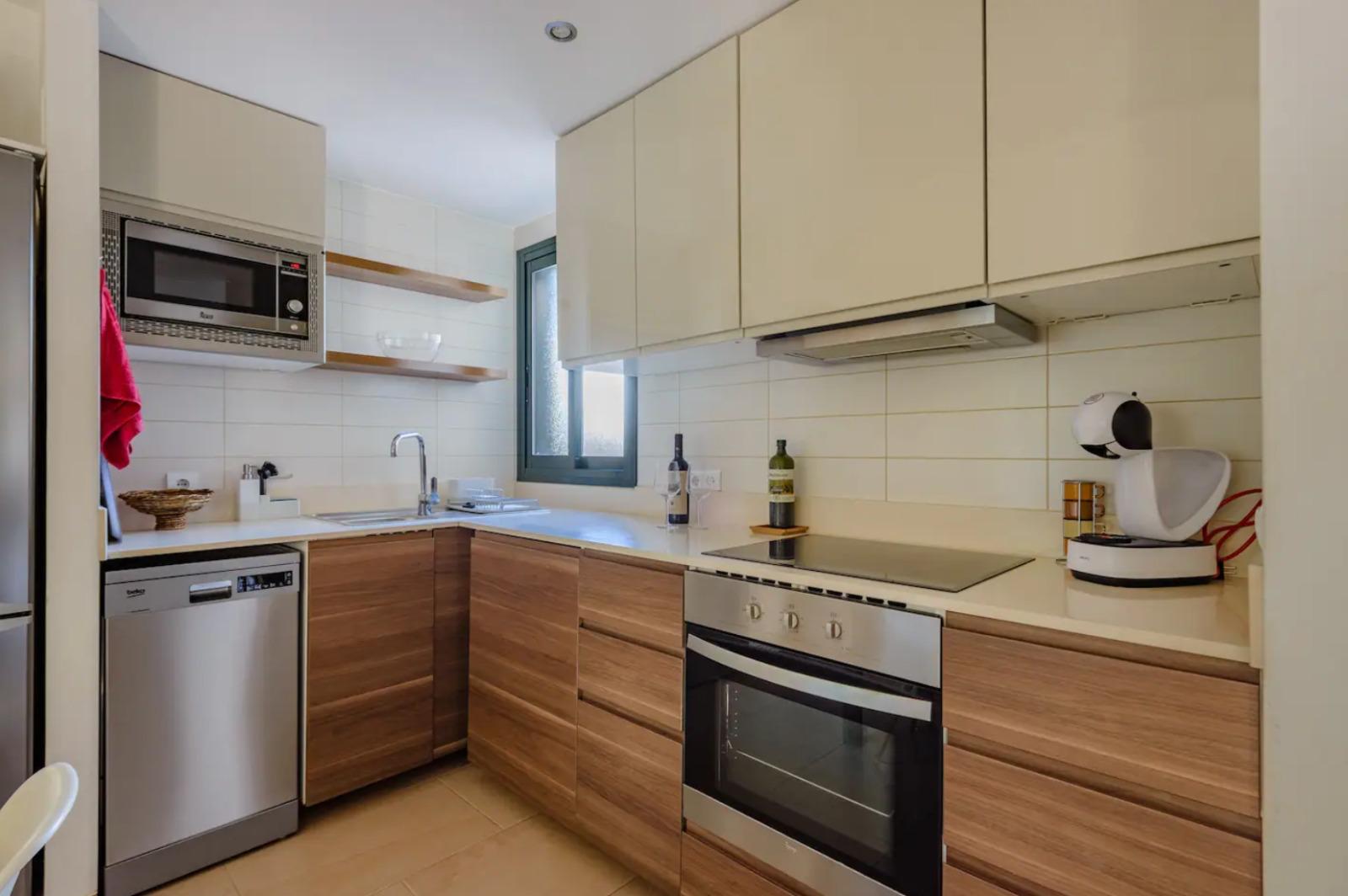 Resa Estates Ibiza te koop for sale townhouse cala tarida kitchen.jpeg